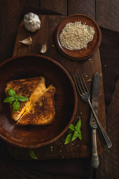istock Grilled Cheese Sandwich  On A Dark Rustic Background 1722621308