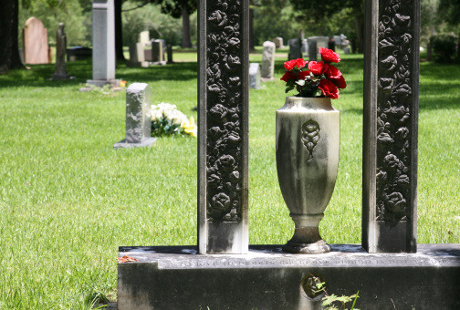 decorated grave on an old cemeterysee also: