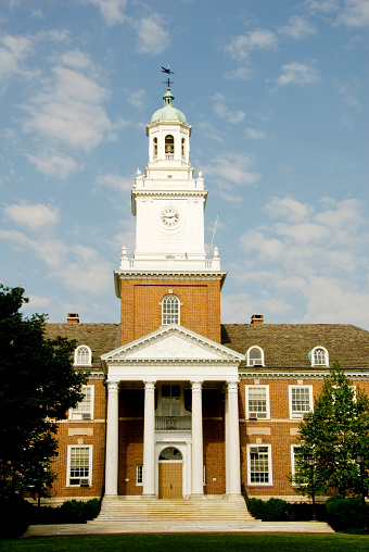university building with bell tower and clock