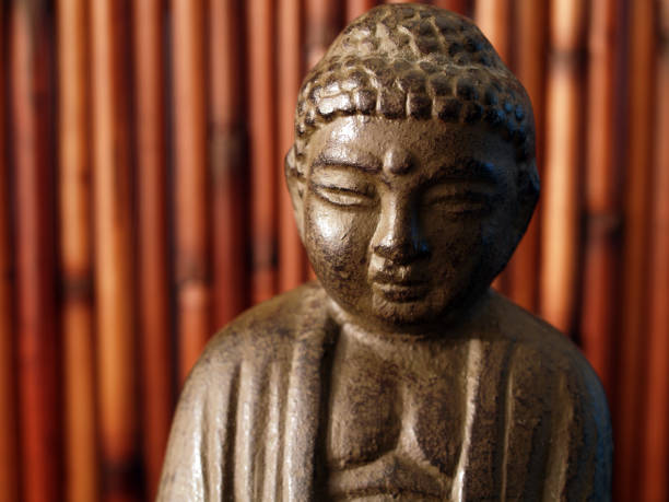 istock Buddha in front of bamboo 172264842