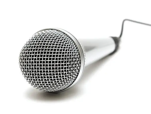 Photo of Microphone laying down isolated on white