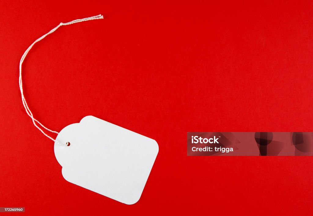 Price tag on red "Blank white price tag on red background - perfect for sale items.See my other paper, book and newspaper images:" Blank Stock Photo