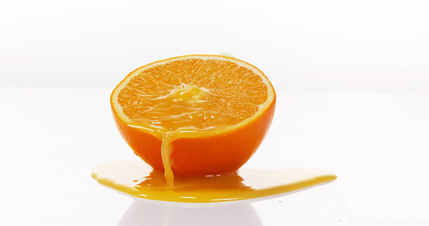 istock Orange, citrus sinensis, Fruit Flowing against White background 1722663214