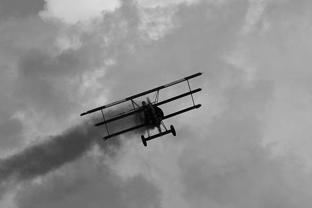 WWI Triplane WWI Fokker Triplane in black and white. world war i photos stock pictures, royalty-free photos & images