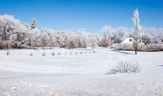 a snowy plain amid the mountain peaks in Regional Park of the Catalan Pyrenees