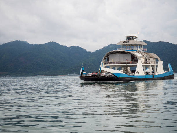 istock A ferry boat in a sea approaching a tropical island. 1722667130