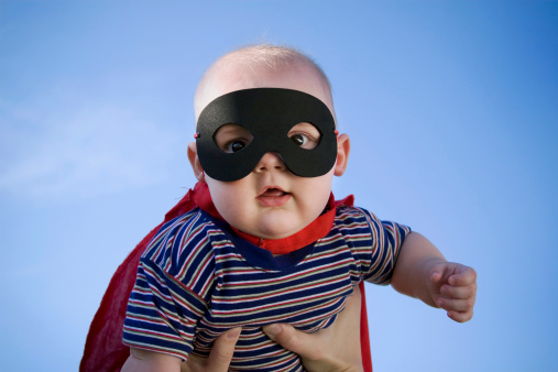 Little Super Baby flying high and fighting crime.