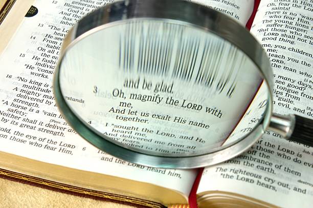 istock Religious: Magnify the Lord Bible scripture with magnifying glass 172267509
