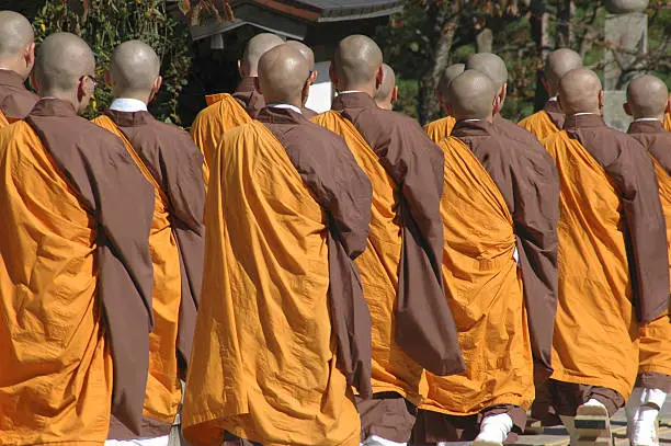 "Buddhist monks in procession in Koya-san, Japan"