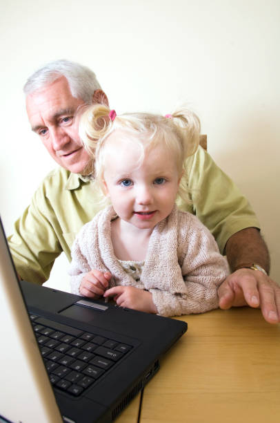 istock grandfather and little grandaughter 172267769