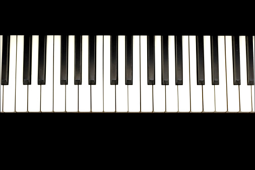 An old piano keyboard. The whites are deliberately bleached out to give a very high contrast image. Adobe RGB 1998 profile.