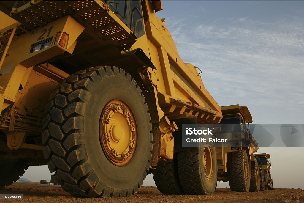 SUPER TRUCKS Mining Machines parked up on shift change. Mining - Natural Resources Stock Photo