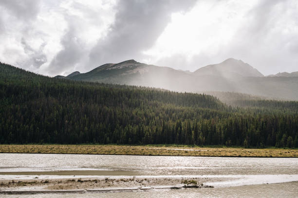 istock Scenic view of mountains and river 1722682921