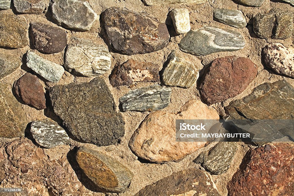 Wall Strong wall made with a variety of rocks. Abstract Stock Photo