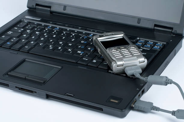 istock Laptop with PDA mobile phone 172268385