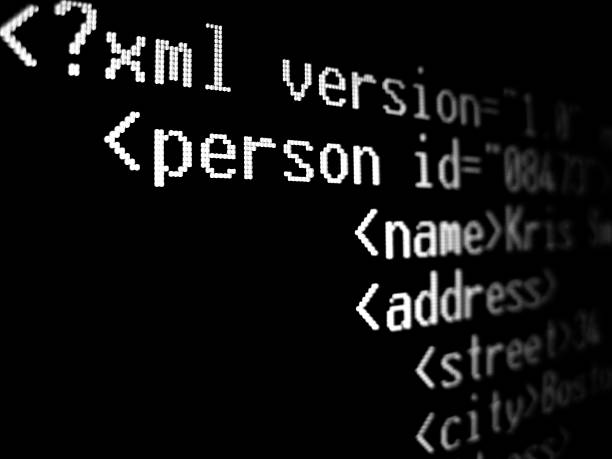 xml document Close-up of an xml document describing a person.Programing lightbox: extensible markup language photos stock pictures, royalty-free photos & images