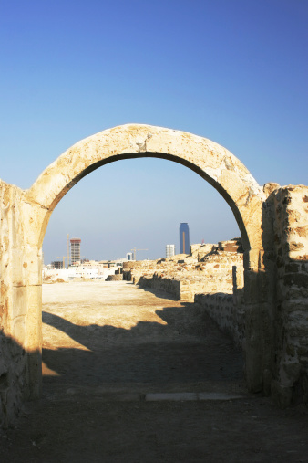 Ancient archway frames the new world.