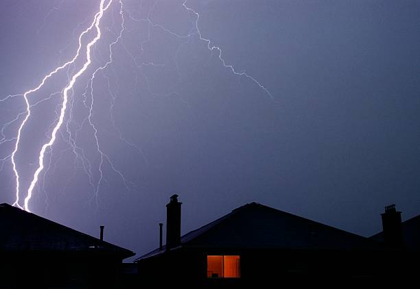 Lightning Strikes home stock photo