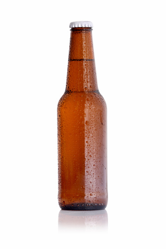 Empty beer bottles with cap. plastic bottle of water isolated on a white background