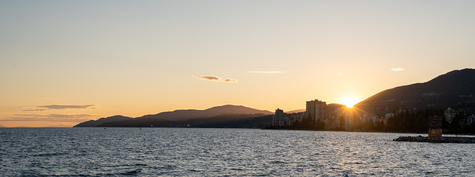 View across bay to sunsetting over Vancouver skyline