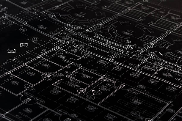 Black Blueprint A very dark blueprint with a little light on it. autocad house plans stock pictures, royalty-free photos & images