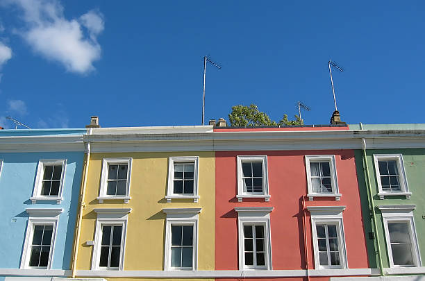 Colorful London houses Pastel coloured terraced houses (Notting Hill, London) notting hill stock pictures, royalty-free photos & images