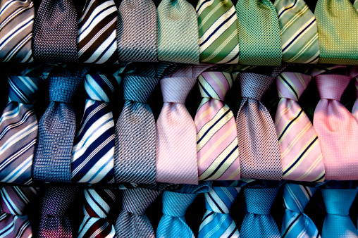 Rows of colorful ties on display.