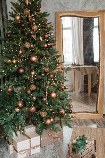 istock Bronze balls on the Christmas tree. Christmas tree design decorations. The concept of celebrating New Year and Christmas. 1722701723
