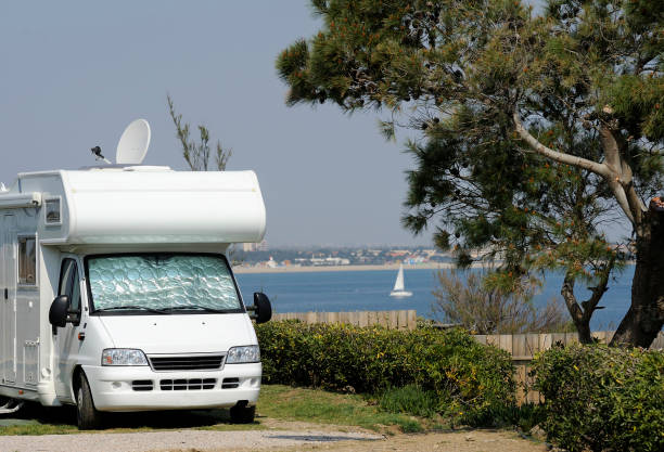 istock Camper at a camping with view at the sea 1722704875