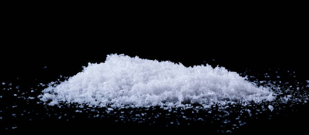 istock Pile of snow isolated on a black background. 1722707073