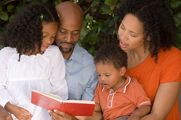 istock African Amreicn Family Reading 172270894