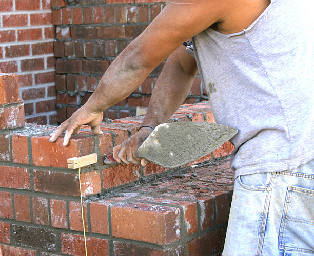 Hardworking mason stock photo