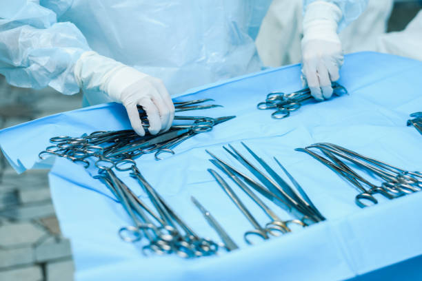 istock A nurse prepares medical instruments for surgery for surgeons 1722714070