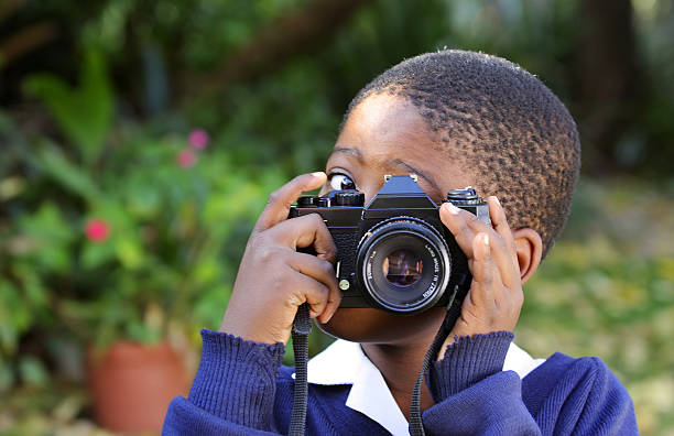 Uśmiech-uczeń z kamery – zdjęcie