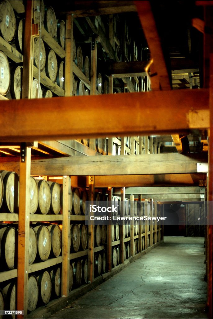 whiskey barrels in a distillery "whiskey aging in barrels in a distillery, Lynchburg, Tennessee" Barrel Stock Photo