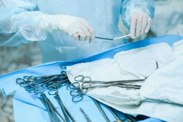 istock A nurse prepares medical instruments for surgery for surgeons 1722717306