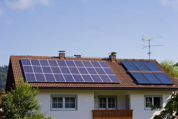 istock House with solar panels on the roof 172272413