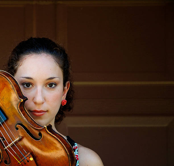 istock Young Woman with Violin 172272423