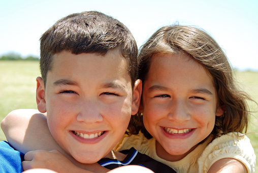 Close-up of a cute brother and sister.