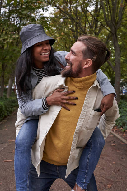 istock Lovely mixed race couple enjoying day out. 1722740706