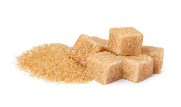 istock Granulated and cubed brown sugar on white background 1722741270
