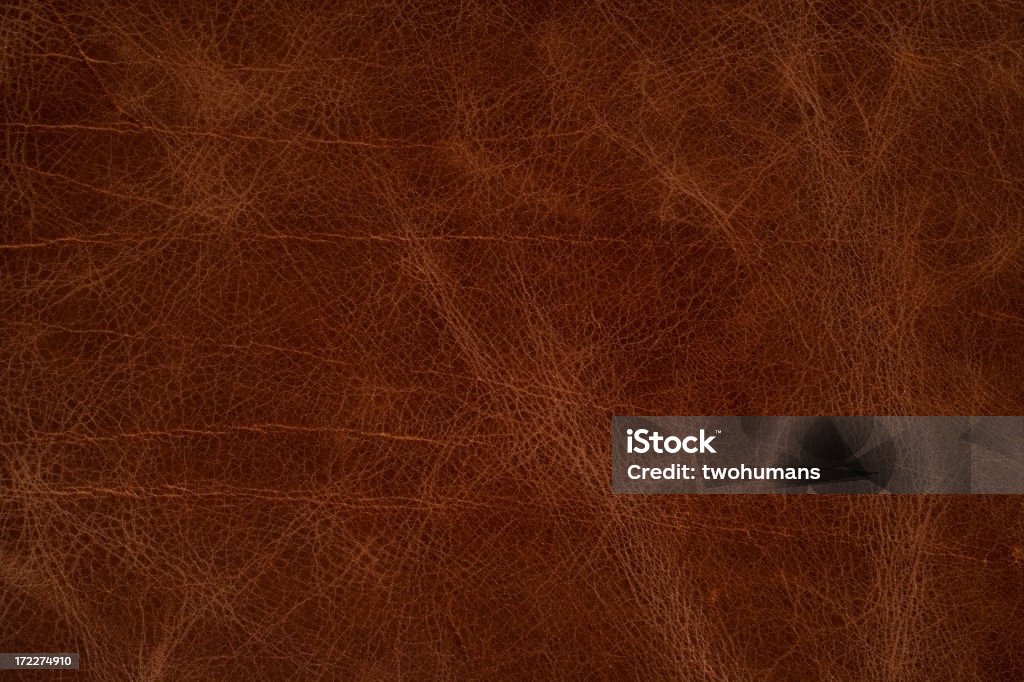 Smooth leather Abstract - close-up of a brown leather sofa. Abstract Stock Photo