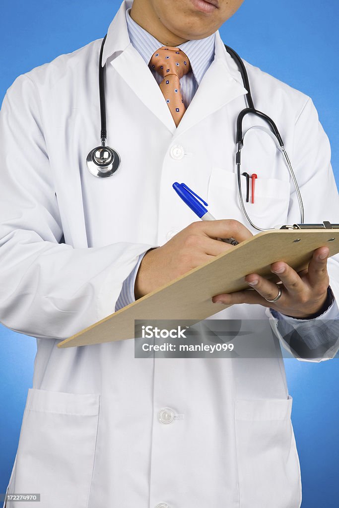 Médico com a área de transferência - Royalty-free Azul Foto de stock