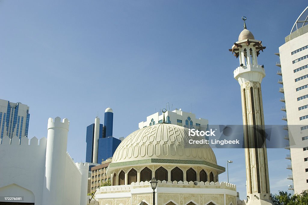 Abu Dhabi diverse Abu Dhabi. A combination of a mosque and modern recognizable Abu Dhabi architecture. Architecture Stock Photo