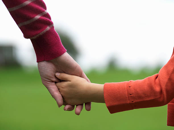 istock Mother and child holding hands 172276276