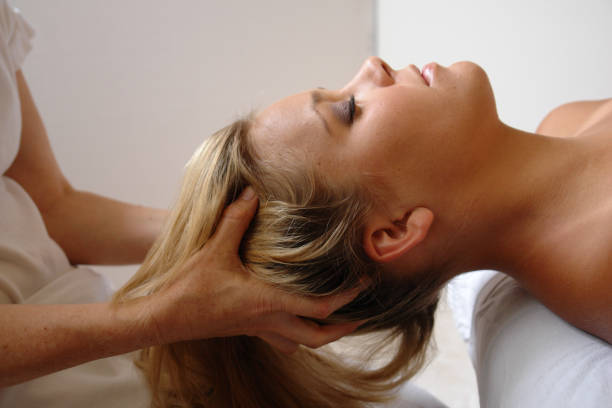 scalp massage - craniosacral stock photo