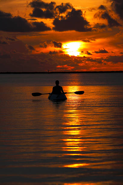 istock woamn in kayak enjoying Florida Keys' sunset 172277585