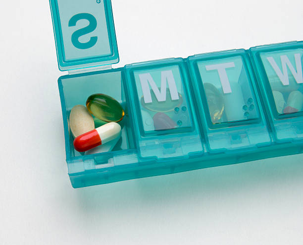 Pills in box stock photo