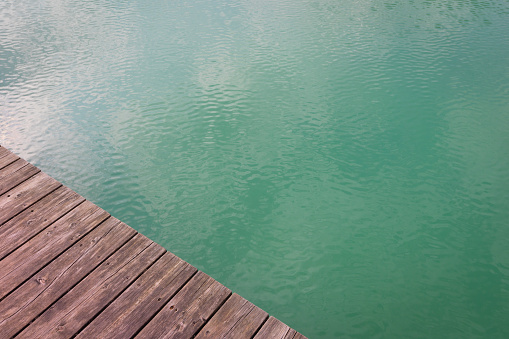 clear green water of an alpine lake