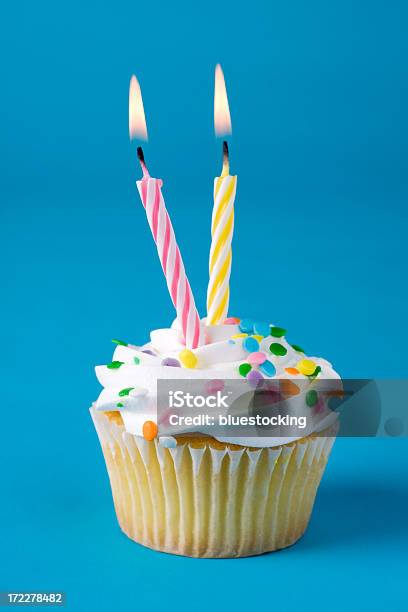 Cupcake With Two Candles Stock Photo - Download Image Now - Two Objects, Number 2, Candle